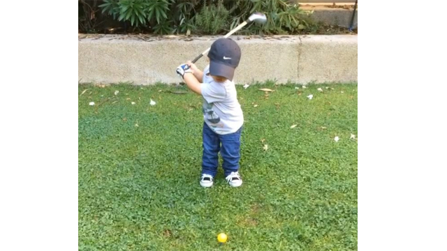 Have you ever seen a 2-year-old with a better swing than this?