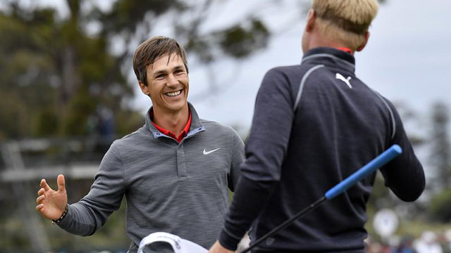 Denmark holds off challenge to win World Cup of Golf