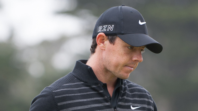 Pre-championship favorite McIlroy hangs on to hope for final round