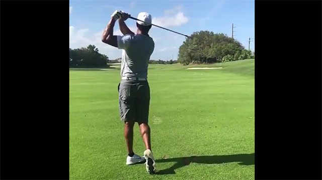 Tiger Woods post video hitting iron shots 