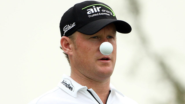 Donaldson breaks course mark to lead BMW Masters, McIlroy five back