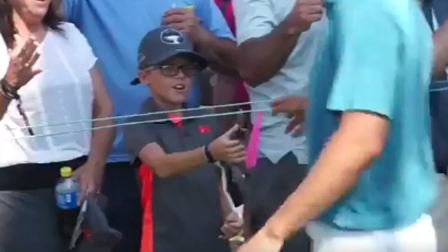 Young fan has adorable reaction to receiving golf ball from Jordan Spieth