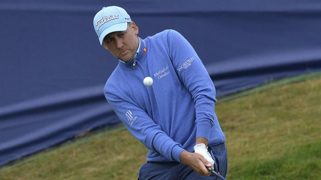 Ian Poulter conquers brutal conditions, shares Scottish Open lead