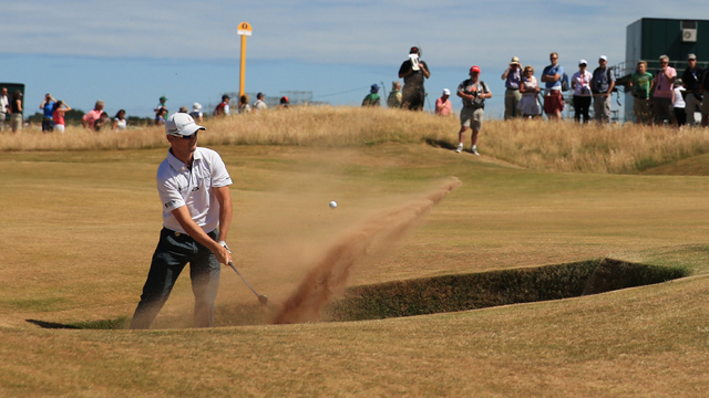 Johnson leads Open Championship after first round, Woods three off pace