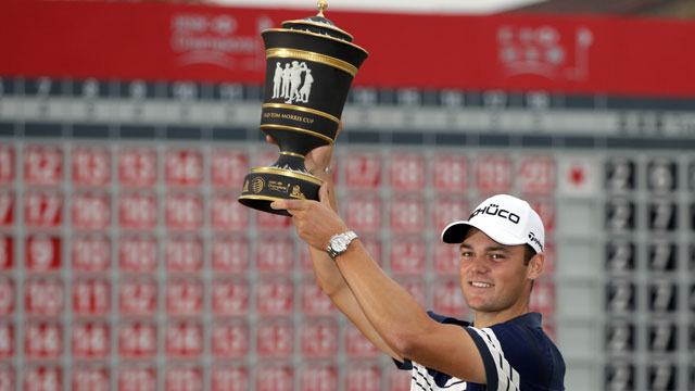 Kaymer roars from five back to win HSBC Champions with closing 63