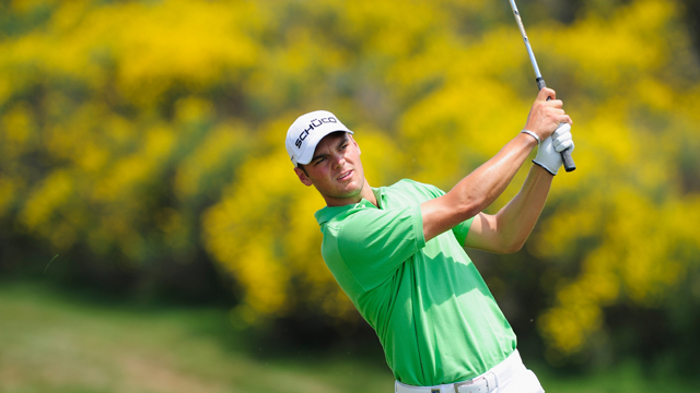 Defending champ Kaymer up into second behind Canizares in France
