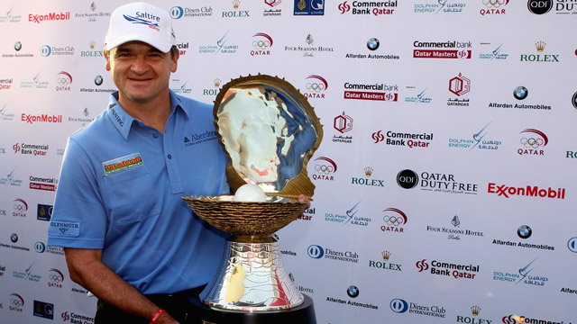 'Chippy' Lawrie chips in twice to win Qatar Masters for second time