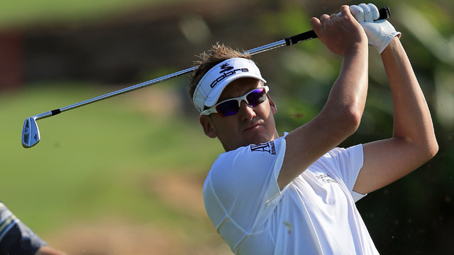 Poulter and Donald look for strong finish in Dubai, in McIlroy's shadow