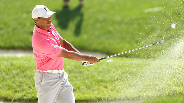 Tiger Woods shot a 68 to climb into top 10 at the Memorial Tournament