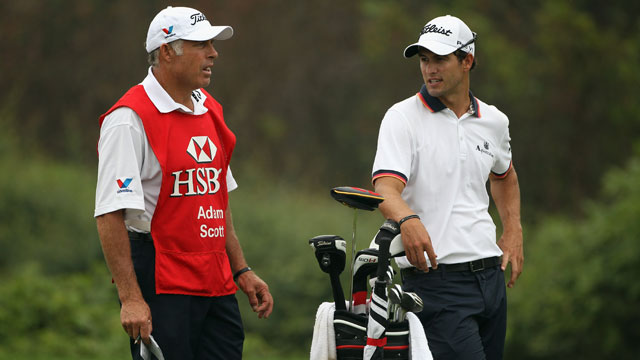 In midst of storm over caddie, Scott stays in hunt at HSBC Champions