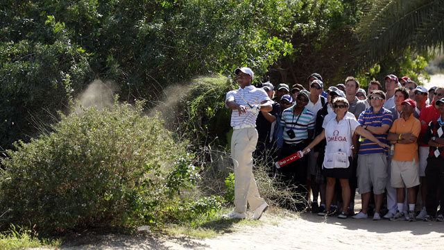 Woods creeps to within one of leaders on windy Moving Day in Dubai
