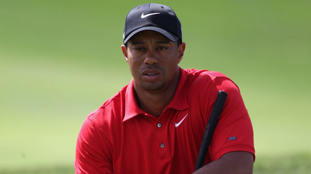 Woods apologizes after being fined for spitting during Dubai Classic