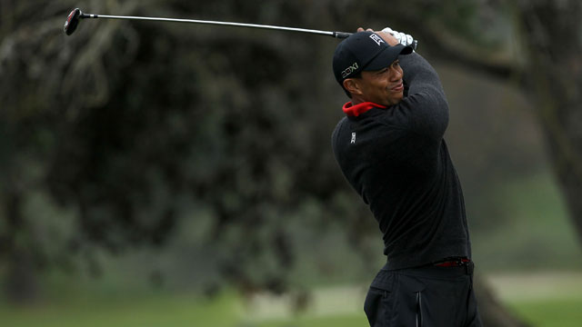 Woods using crutches and boot, still expects to play U.S. Open next month