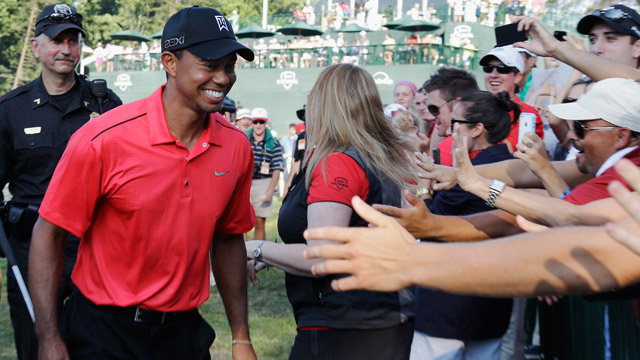 Woods stays fourth in world ranking, on brink of major money milestone